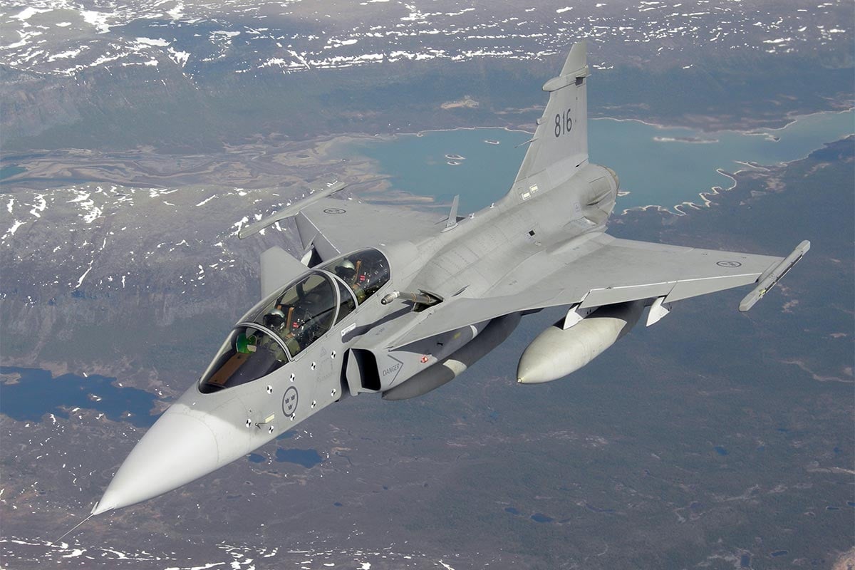 A JAS 39 Gripen fighter aircraft in the air