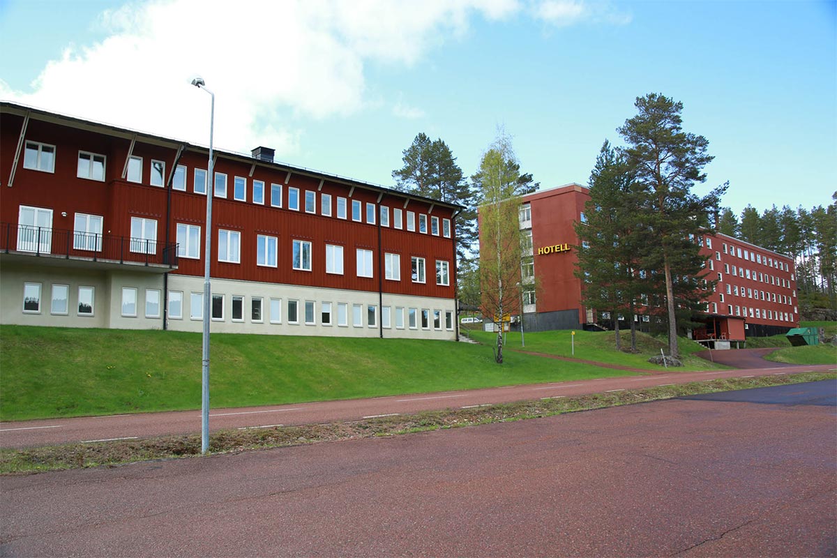 Two red accomodation buildings 